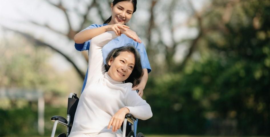 An old patient with her carer.